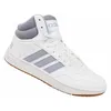 A white Adidas Hoops 3.0 Mid sneaker with gray accents and a brown sole, shown from a side angle against a white background. Produktbild-Vorschau
