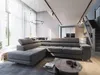 A modern living room with a large sectional sofa, dining area, and stairs leading to an upper level. Produktbild-Vorschau