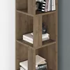 A close-up view of a wooden bookshelf with books and a camera on it. Voir les images du produit