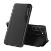 A black flip case for a smartphone is shown, with the phone partially visible inside. Produktbild-Vorschau