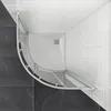 A top-down view of a modern shower enclosure with a curved glass door and white tiled walls. Podgląd zdjęcia produktu