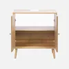 A wooden vanity cabinet with two doors open, showing the interior shelves and legs. Anteprima dell’immagine prodotto