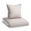 A folded duvet and pillow on a white background. Produktbild-Vorschau