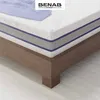 A close-up view of a mattress on a wooden bed frame. Náhľad obrázku produktu