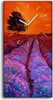 A painting of a lavender field with a tree and a sunset in the background, with clock hands superimposed. Produktbild-Vorschau