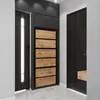 A modern entryway with a black and wood shoe cabinet and two dark wood doors. Produktbild-Vorschau