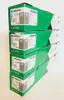 A stack of four Lexmark toner cartridge boxes. Voir les images du produit