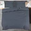 A top-down view of a bed with anthracite bedding. Voir les images du produit