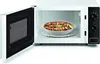 A white microwave oven with its door open, showing a dish of ratatouille inside. Produktbild-Vorschau