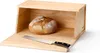 A wooden bread box with a loaf of bread inside and a knife on the open lid. Podgląd zdjęcia produktu