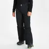 A child wearing black ski pants. Produktbild-Vorschau