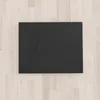 A black shower tray is placed on a light-colored wooden floor. Produktbild-Vorschau