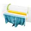 A radiator drying rack with clothes hanging on it. Produktbild-Vorschau