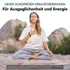 A woman meditating outdoors with text overlays. Produktbild-Vorschau