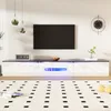 A modern living room setup featuring a TV stand with LED lighting, a television, and decorative items. Anteprima dell’immagine prodotto