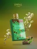 A perfume bottle with pistachio and chocolate elements, set against a gradient green and brown background. Náhled obrázku produktu