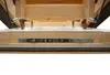 A close-up view of the locking mechanism and wooden frame of a loft ladder. Produktbild-Vorschau