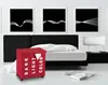 A bedroom scene with a bed, laundry basket, and artwork. Náhľad obrázku produktu