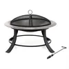 A black and silver fire pit with a mesh screen and a poker tool. Produktbild-Vorschau