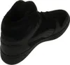 A black Puma high-top sneaker with fur lining, shown from a side-rear angle on a white background. Produktbild-Vorschau