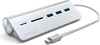 A silver Satechi USB-C hub with multiple ports and a white cable with a USB-C connector. Náhled obrázku produktu