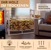 A firewood rack filled with logs, placed indoors next to a sofa and a guitar. The image also includes text overlays highlighting product features. Podgląd zdjęcia produktu
