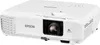 A white Epson projector is shown from a slightly elevated front-left angle on a white background. Voir les images du produit
