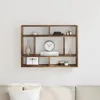 A wooden wall shelf mounted on a white wall, displaying various decorative items. Náhled obrázku produktu