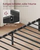 Close-up view of a black metal bed frame with text overlays highlighting its features. Produktbild-Vorschau