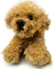 A plush toy dog sits on a white background. Produktbild-Vorschau