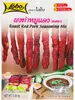 A package of roast red pork seasoning mix with images of the prepared dish. Anteprima dell’immagine prodotto