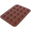 A brown silicone mold for baking nuts or chocolates, with multiple egg-shaped cavities. Anteprima dell’immagine prodotto