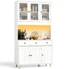 A white sideboard with glass doors and drawers, filled with kitchen items and decorative objects. Náhled obrázku produktu