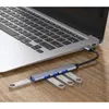 A USB hub is connected to a laptop, with several USB flash drives plugged into the hub. Produktbild-Vorschau