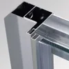 A close-up view of the corner of a shower enclosure frame, showing the aluminum profiles and glass. Produktbild-Vorschau