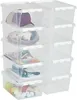 A stack of clear plastic storage boxes filled with various items. Produktbild-Vorschau