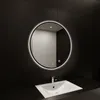 A round LED mirror is mounted on a black tiled wall above a white sink in a modern bathroom. Produktbild-Vorschau