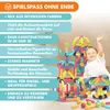 A child is playing with magnetic building blocks, with text overlays describing the product's features. Produktbild-Vorschau