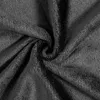 A close-up, swirling view of black plush fabric. Produktbild-Vorschau