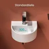 A close-up shot of a white ceramic compact wall-mounted sink with a faucet. Anteprima dell’immagine prodotto