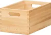 A wooden storage box with handles. Produktbild-Vorschau