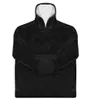 A black hooded blanket with a white interior and a front pocket, laid flat against a white background. Produktbild-Vorschau