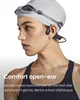 A woman wearing swimming gear and headphones, with text overlay describing the product's comfort. Náhľad obrázku produktu