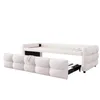 A white upholstered daybed with a pull-out trundle bed, shown with the trundle partially extended. Produktbild-Vorschau