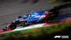 A Formula 1 race car speeding on a track. Produktbild-Vorschau
