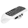 A white wireless keyboard with black keys is shown against a white background. Produktbild-Vorschau