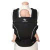 A black baby carrier on a mannequin with a baby doll inside. Produktbild-Vorschau