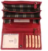 An open red leather wallet showing its interior compartments and card slots. Produktbild-Vorschau
