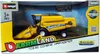 A toy combine harvester in its retail packaging. Voir les images du produit
