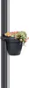 A dark grey planter with colorful flowers attached to a dark grey pole. Náhľad obrázku produktu